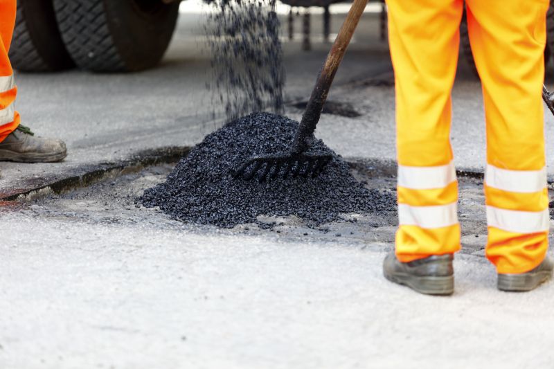 Local Gravel Pothole Filling pros at work